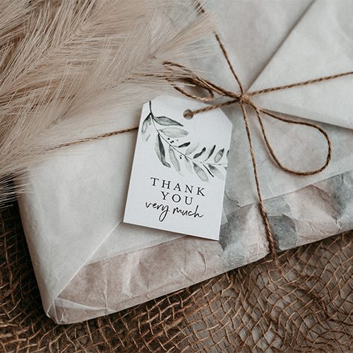 Pochette custodia per fotografie, in pelle color paglia.